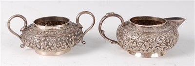 Lot 1436 - A circa 1900 Persian white metal sugar and...