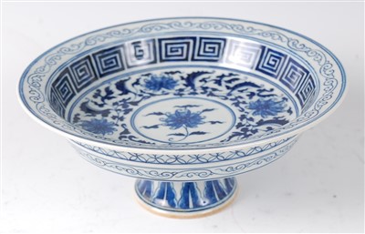 Lot 1422 - A Chinese porcelain blue and white stem bowl,...