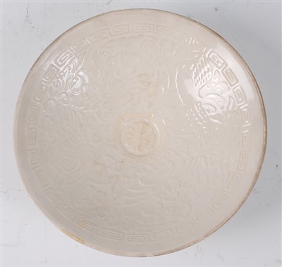 Lot 1423 - A Chinese blanc-de-chine footed bowl, moulded...
