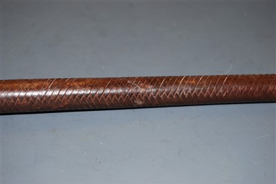 Lot 339 - An early 20th century plaited leather clad riding crop