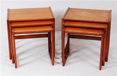 Lot 433 - A pair of 1970s G-Plan teak nests of three...