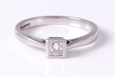 Lot 2674 - A platinum diamond solitaire ring, the...