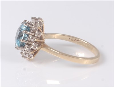 Lot 1272 - An 18ct gold, aquamarine and diamond ring,...