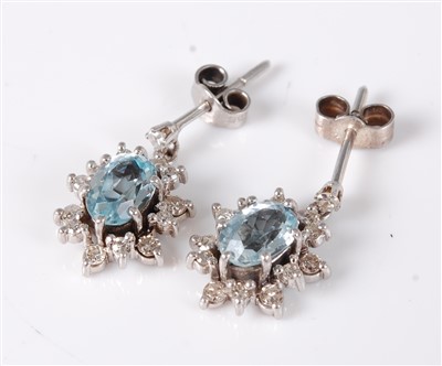 Lot 1273 - A pair of white metal, aquamarine and diamond...