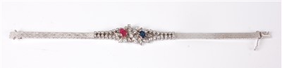 Lot 1274 - A contemporary 18ct white gold, ruby, sapphire...