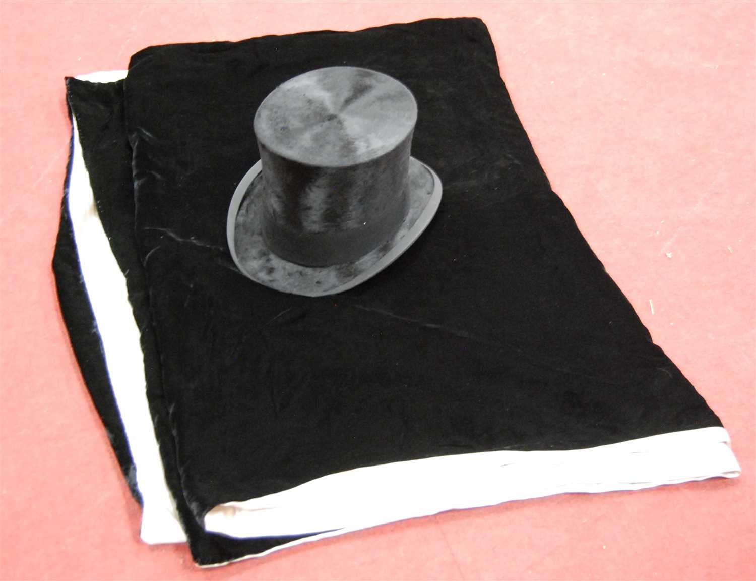 Lot 2 - An Edwardian brushed velvet top-hat, bearing a...