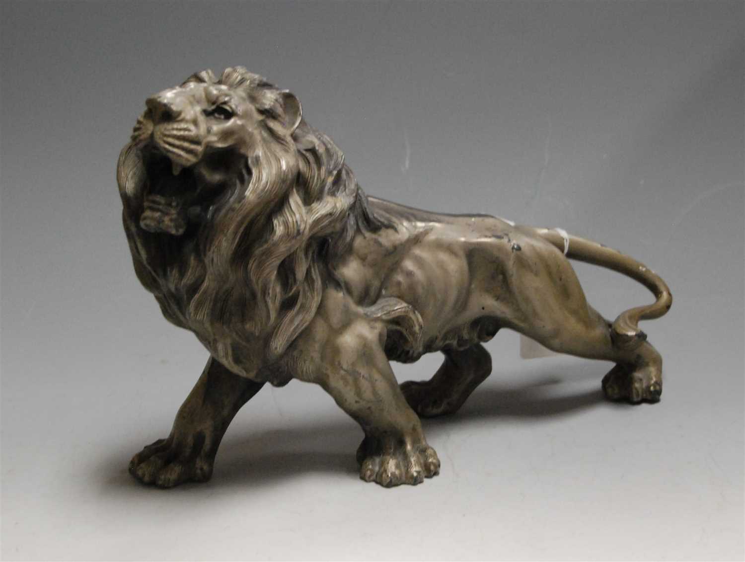 Lot 9 - A large Spelter figure of a lion, in roaring...