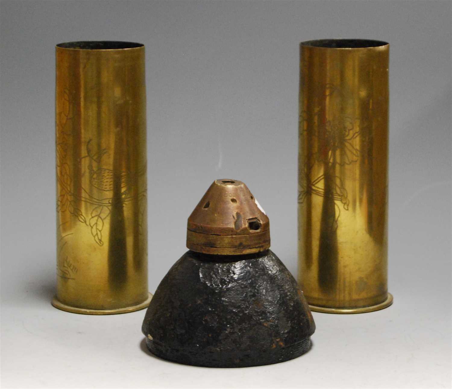 Lot 17 - A pair of WWI trench art shell cases, each...