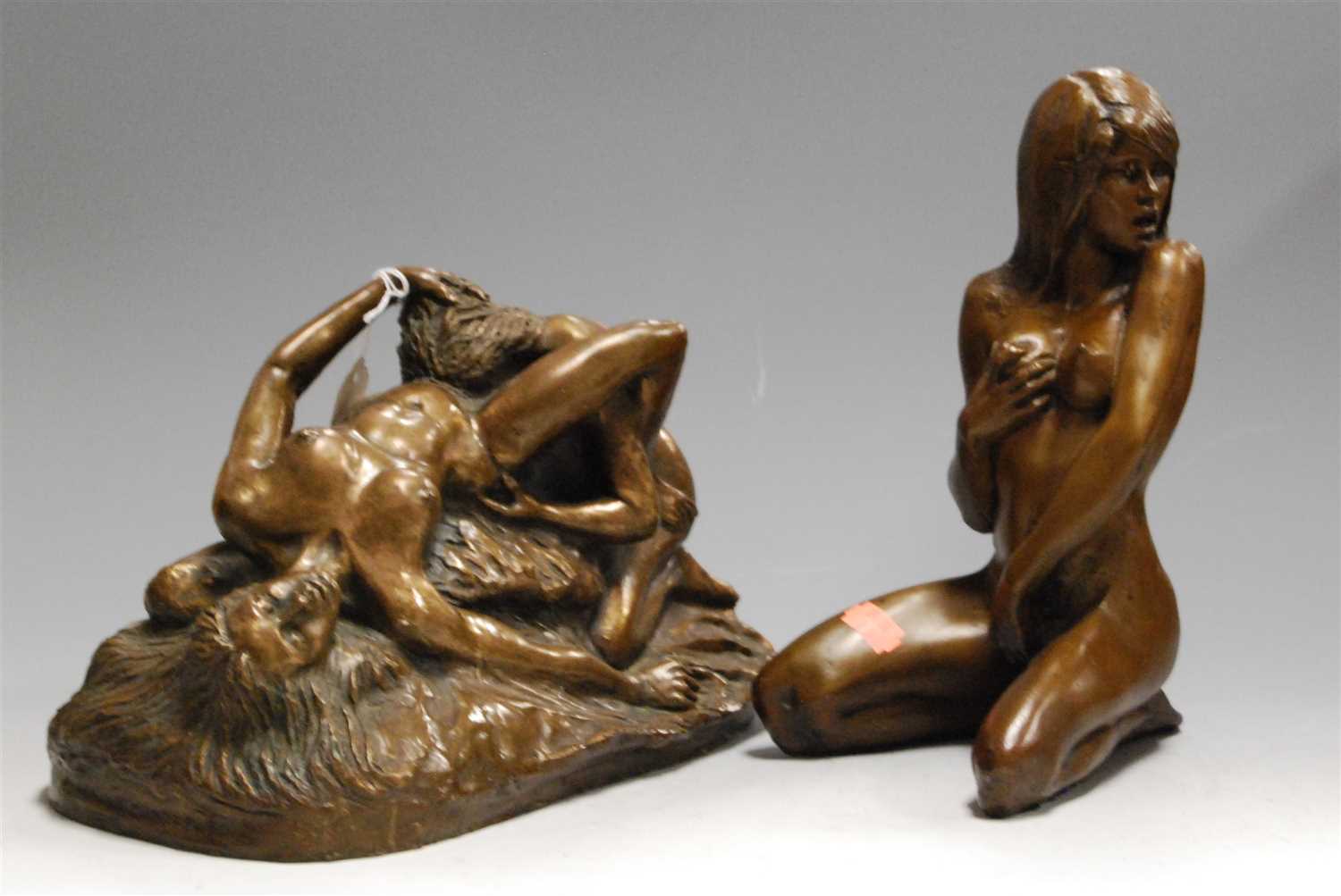Lot 18 - A modern bronzed resin figure of a female nude...