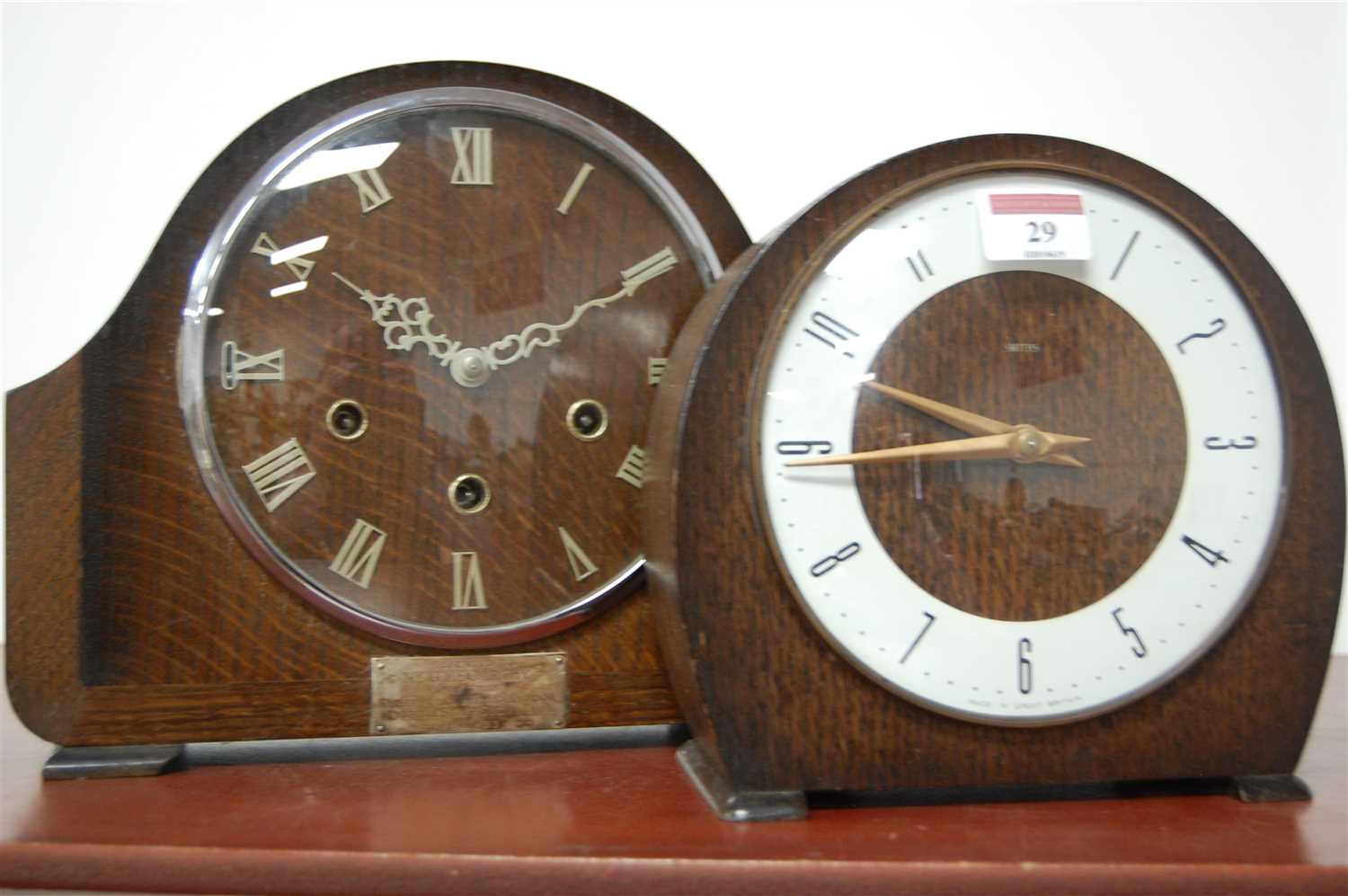 Lot 29 - A 1950s Smiths oak cased mantel clock, having...