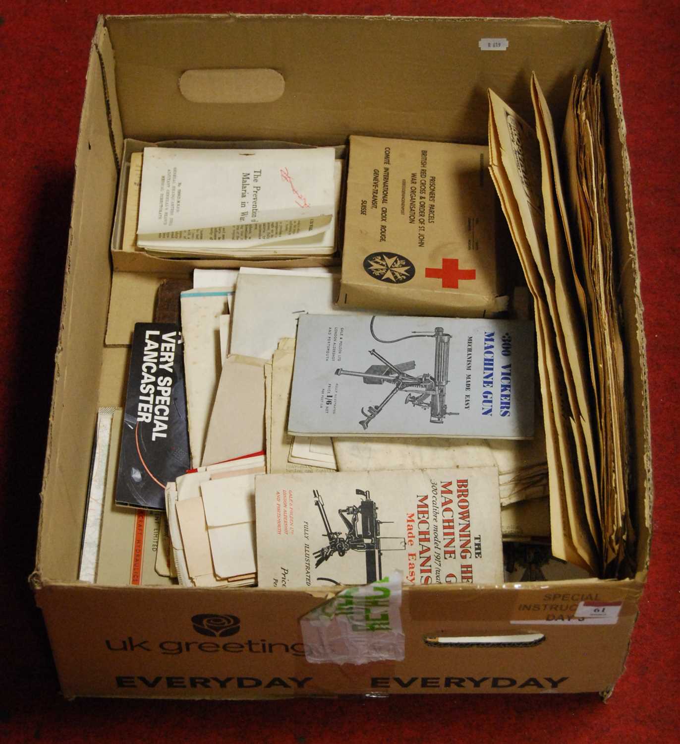 Lot 61 - A box of miscellaneous military ephemera, to...