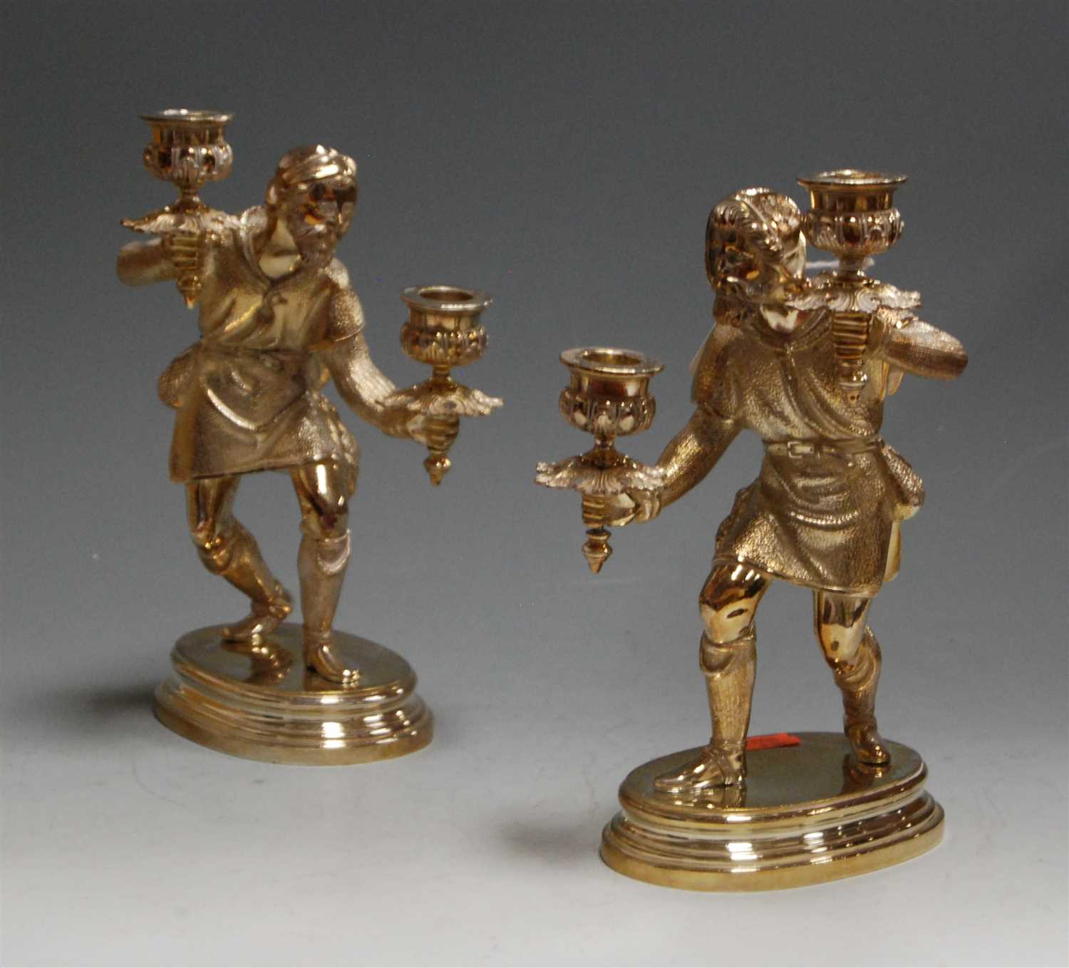 Lot 87 - A pair of silver plated table candlesticks,...