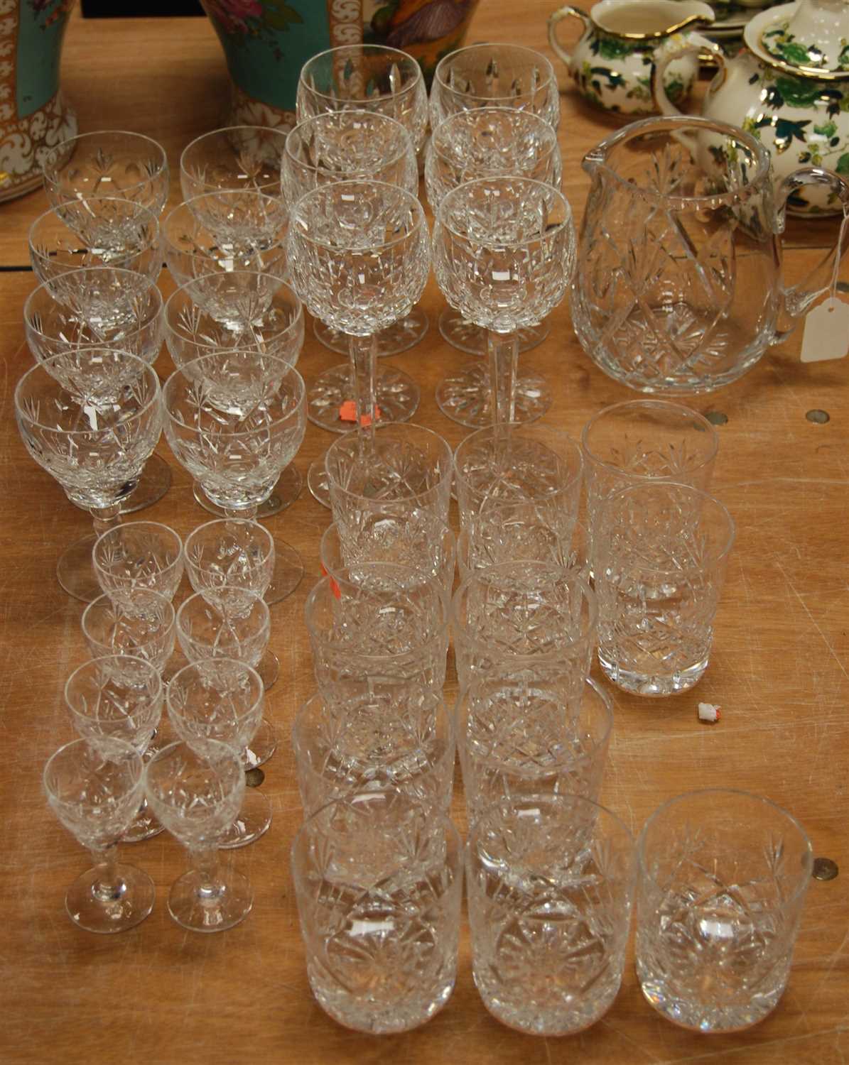 Lot 103 - A mixed suite of cut glassware, to include...