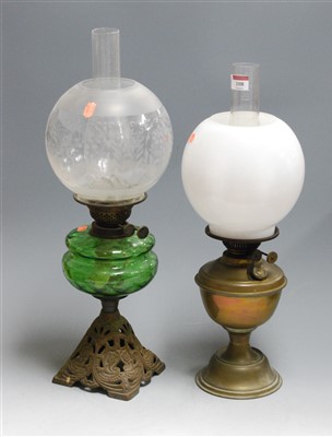 Lot 108 - A Victorian oil lamp, having etched globular...