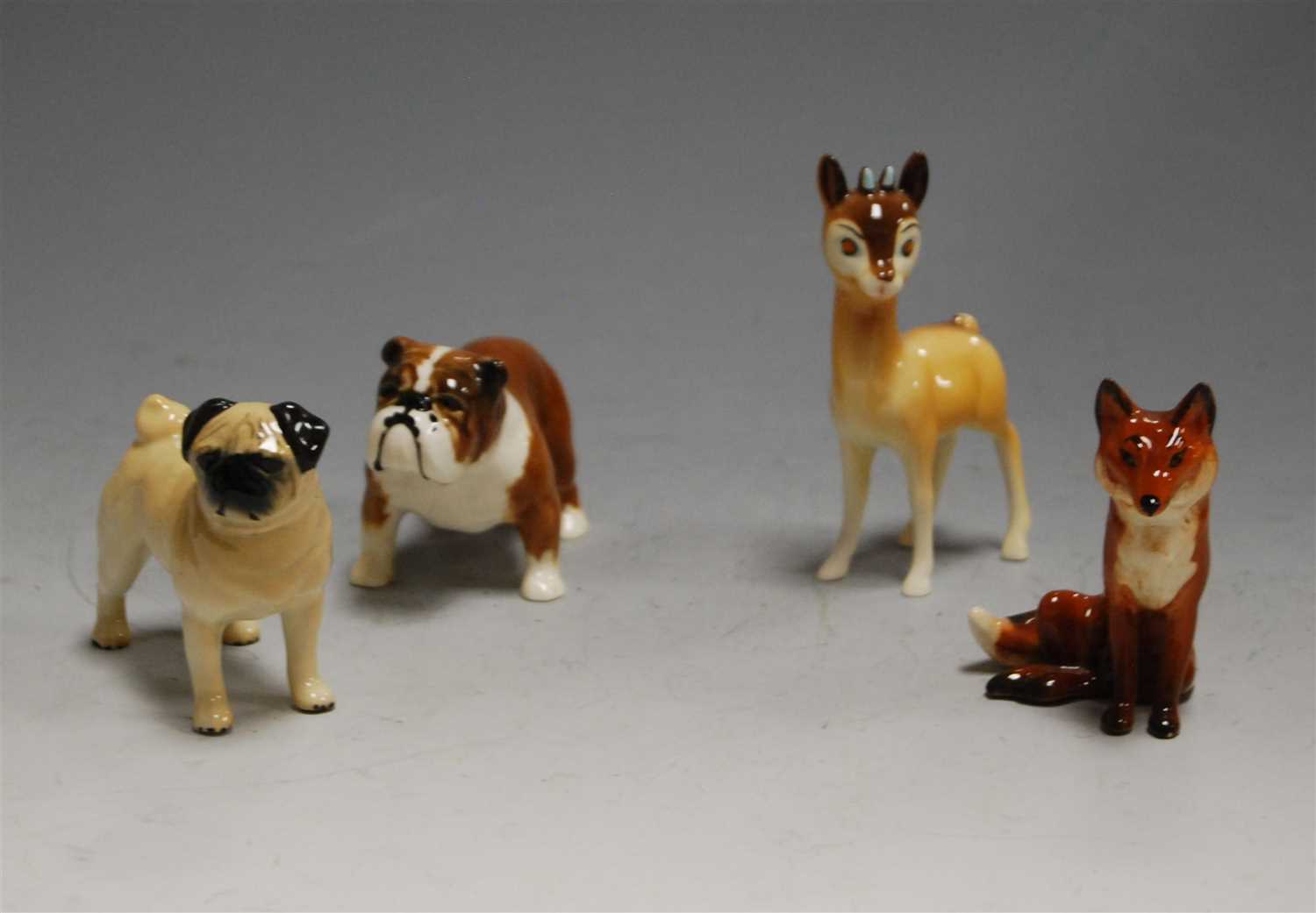 Lot 156 - A collection of four Beswick figures, to...
