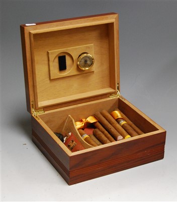 Lot 158 - A faux oak table-top cigar humidor, containing...