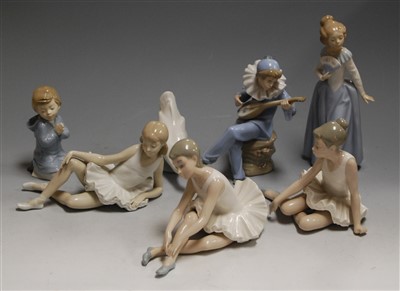Lot 161 - A set of three Nao Spanish porcelain figures...