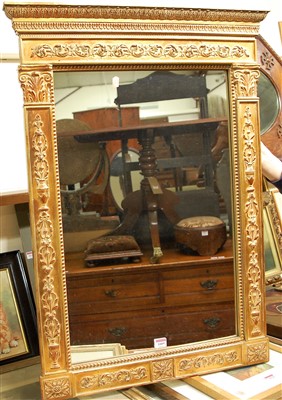 Lot 1009 - A reproduction gilt composition wall mirror, h....
