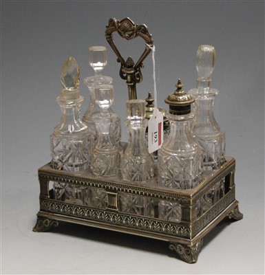 Lot 193 - A Victorian silver plated seven bottle cruet...