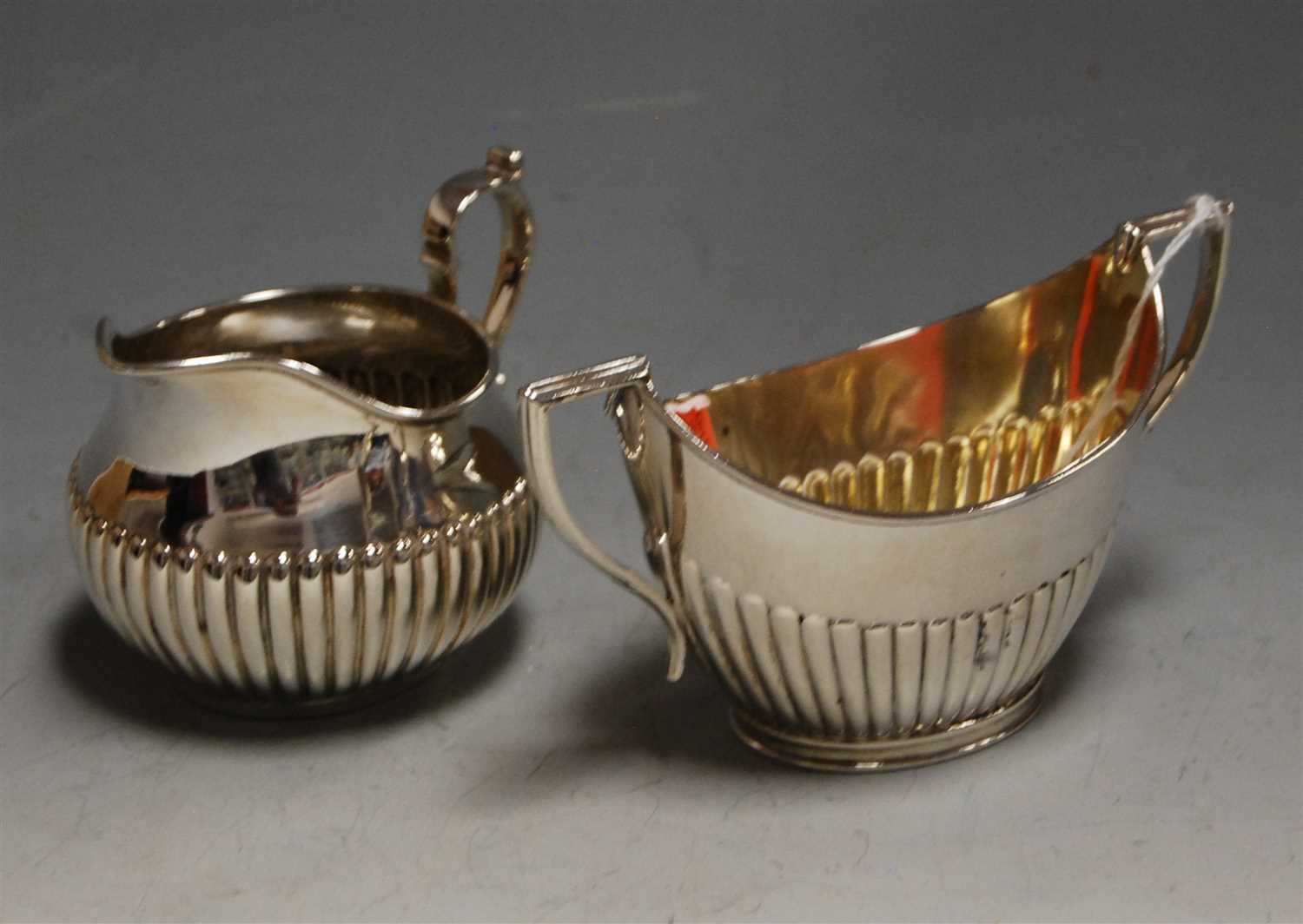 Lot 197 - A late Victorian silver twin handled sugar...