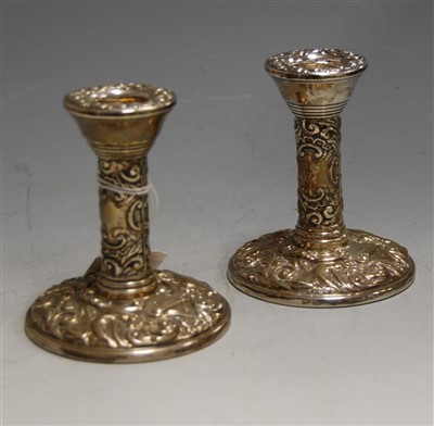 Lot 201 - A pair of silver dwarf candlesticks in the...