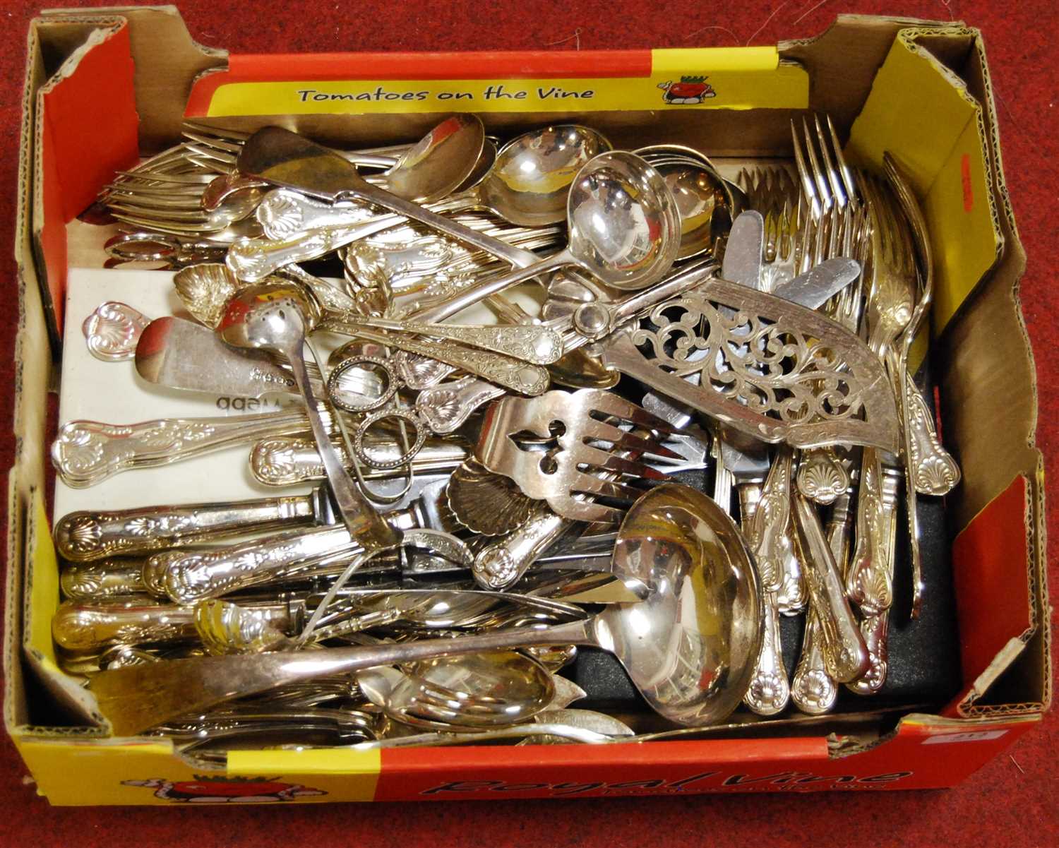 Lot 212 - A box of assorted loose silver plated flatware,...