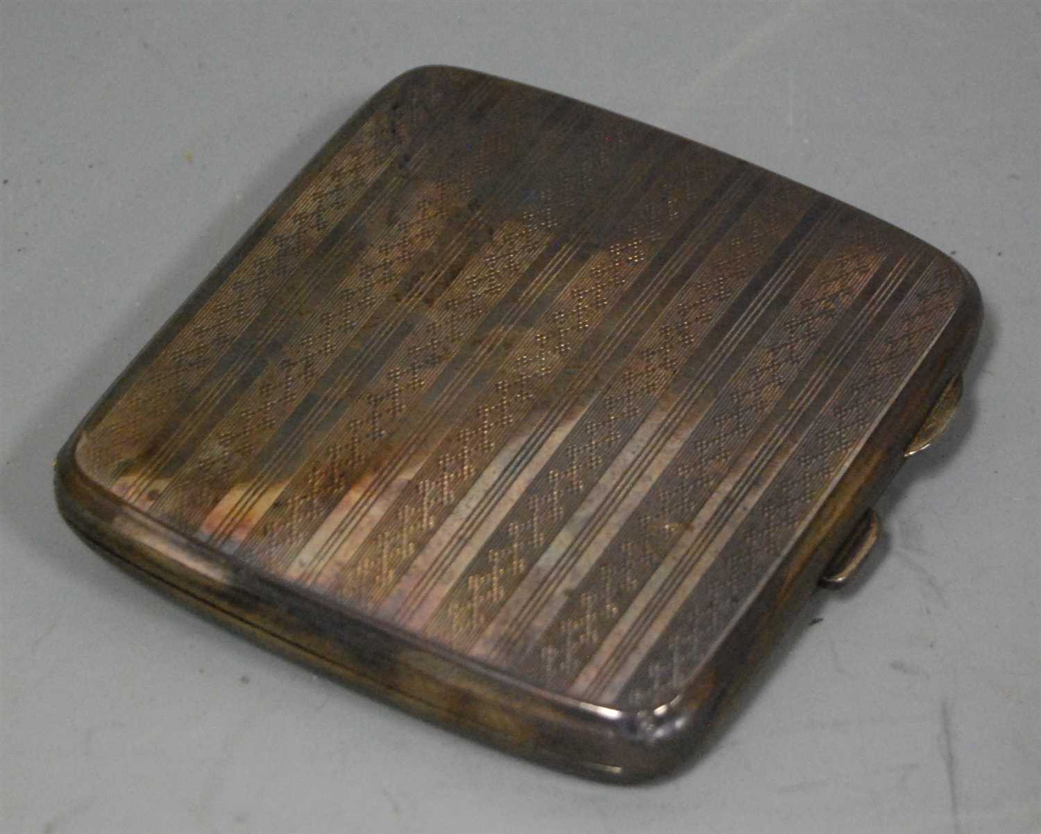 Lot 231 - A George V silver pocket cigarette case,...