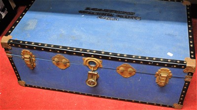 Lot 1068 - A canvas bound trunk with gilt metal fittings