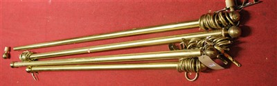 Lot 1072 - Four lacquered brass curtain poles with turned...