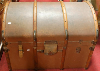 Lot 1081 - A wooden framed canvas bound dome topped trunk