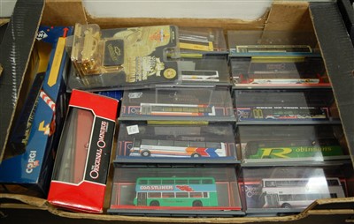 Lot 502 - A collection of boxed diecast metal buses to...