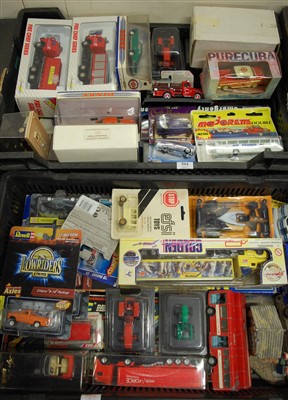 Lot 504 - A collection of boxed and loose diecast models...