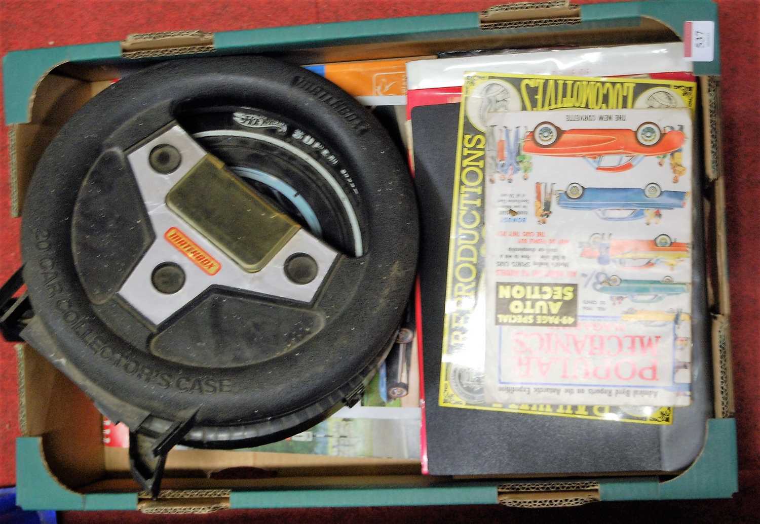 Lot 537 - A box containing two Matchbox steering wheel...