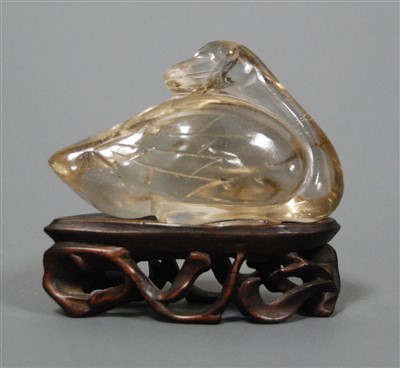 Lot 275 - A Chinese quartz carving of a bird on pierced...