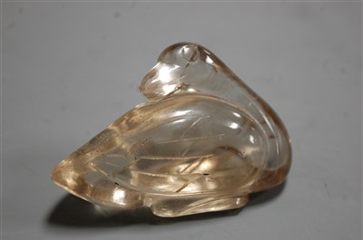 Lot 275 - A Chinese quartz carving of a bird on pierced...