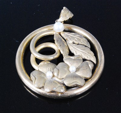 Lot 419 - A pinchbeck leaf and flower pendant, further...