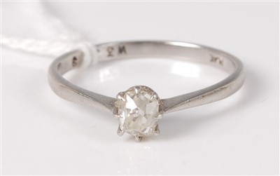 Lot 338 - A white metal diamond solitaire ring, the claw...