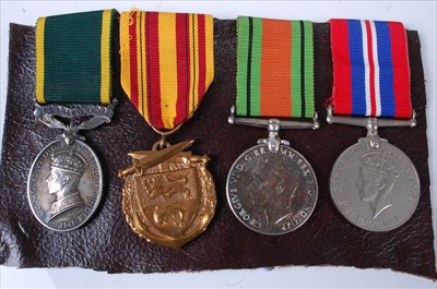 Lot 251 - A group of four medals to include