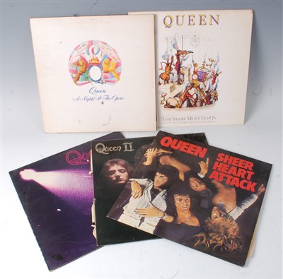 Lot 666 - A collection of five Queen vinyl records to include