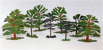 Lot 1313 - A Britains lead tree group to include three...