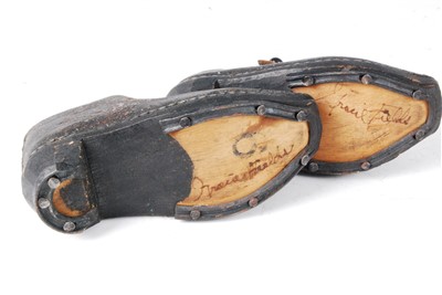 Lot 643 - A pair of child's engraved and brass studded leather tap shoes