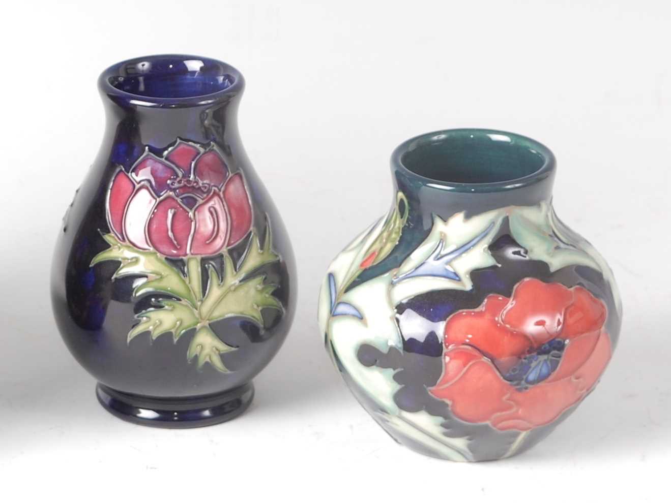 Lot 150 - A modern Moorcroft miniature squat vase in the...