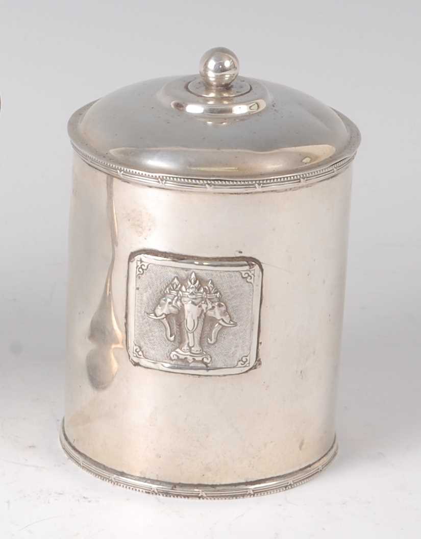 Lot 221 - A 1920s silver cylindrical tea caddy and cover,...