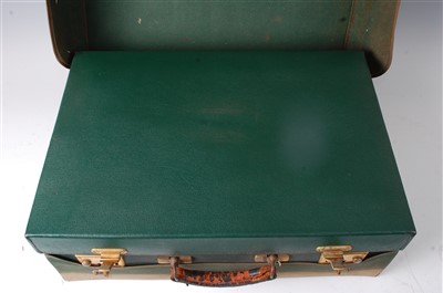 Lot 283 - An Art Deco green leather, silver and enamel...
