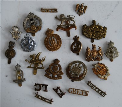 Lot 226 - A collection of assorted cap badges and...