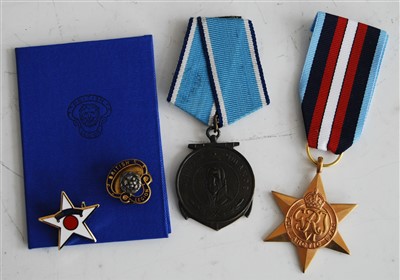 Lot 228 - A British Legion enamelled lapel badge;...