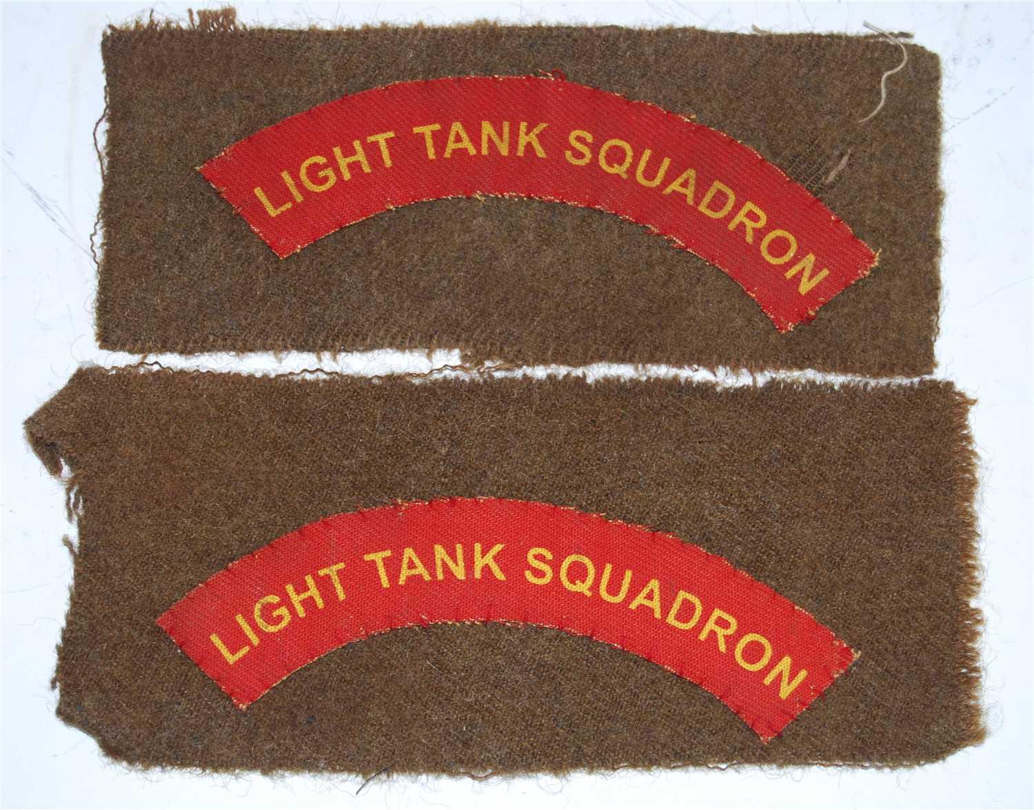 Lot 229 - A pair of Light Tank Squadron cloth shoulder...