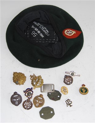 Lot 241 - A collection of cap and lapel badges, to...