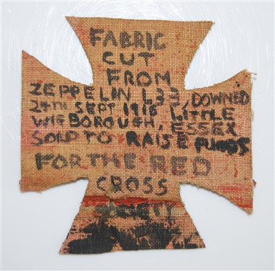 Lot 242 - A canvas cross, hand-written verso 'Fabric cut...