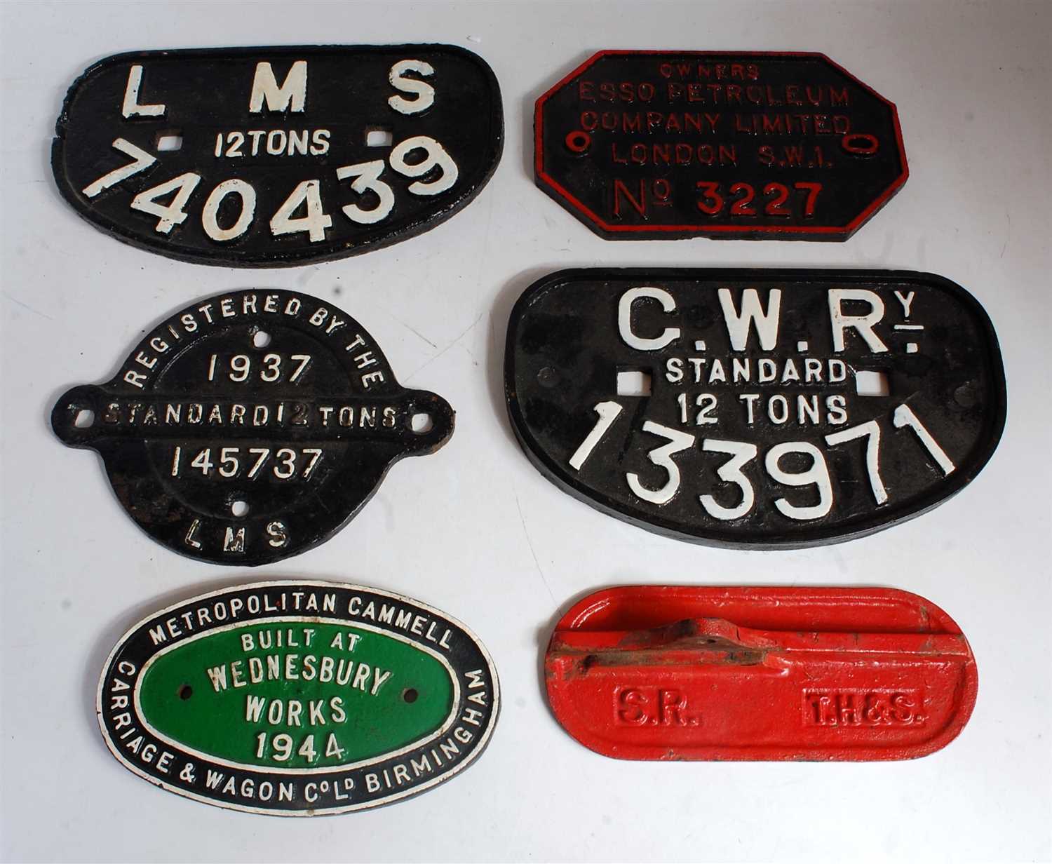 Lot 15 - Six various cast iron railway wagon plates and...